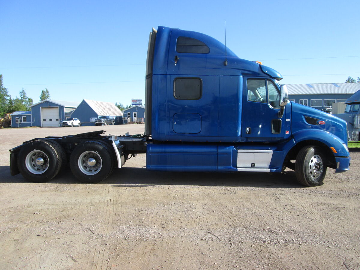 <p>2012 Peterbilt 587 highway tractor, Paccar MX-13 455HP,Manual 13 speed transmission with overdrive, Peterbilt airride suspension, Eaton DS405 differential, 3.55 ratio, axle ratings 12000lbs front 40000lbs rear, bud aluminum wheels, 11R22.5 tires ( wear remaining 50% front, 50% front rear, 80% rear rear,) commercial MVI, 1267000kms. Phone 902-859-2350 for further details on this good working unit. $20500</p>